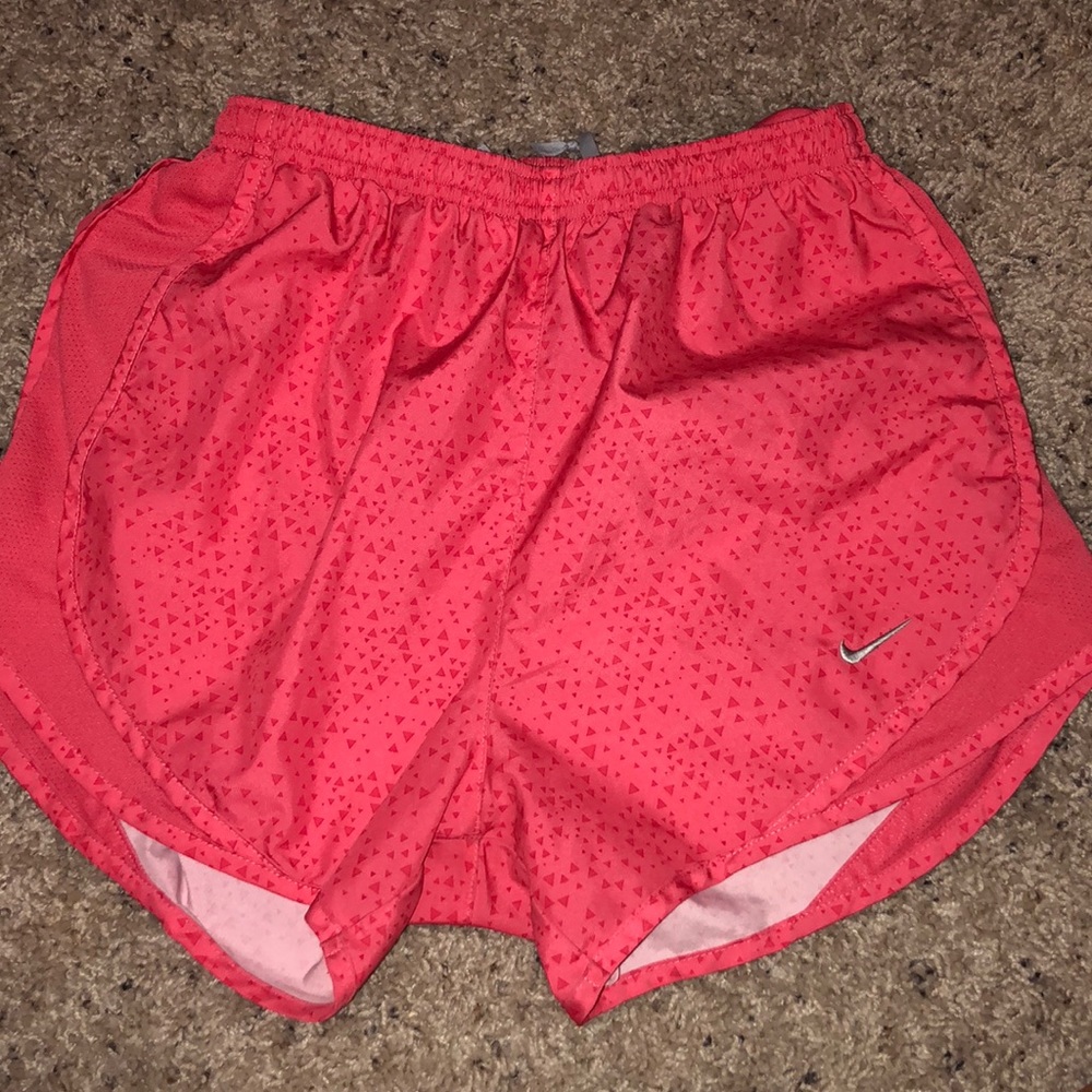 Coral nike shorts with triangle pattern